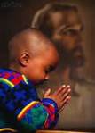 African child Prays to Jesus